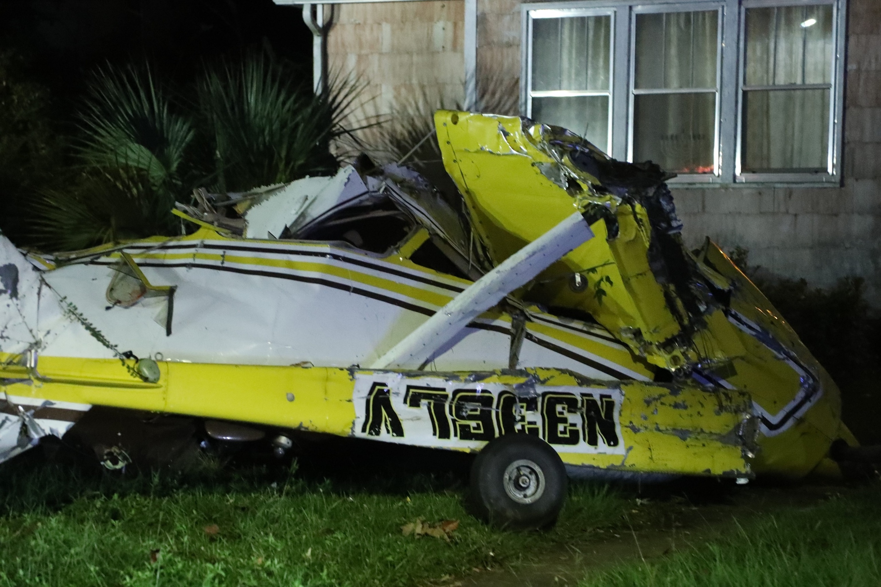 PHOTO: A broken Cessna rests on the front yard of a home on East 66th Street after crashing on Oct. 13, 2024 in Savannah, Ga.